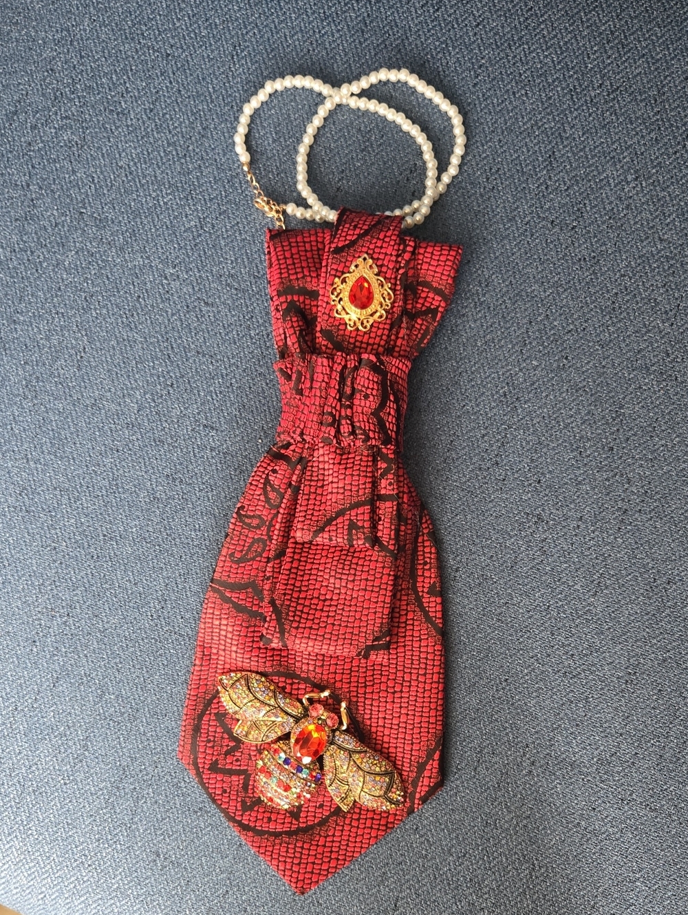 3/$60 Red and Black Patterned Cravat with Jeweled Bee brooch